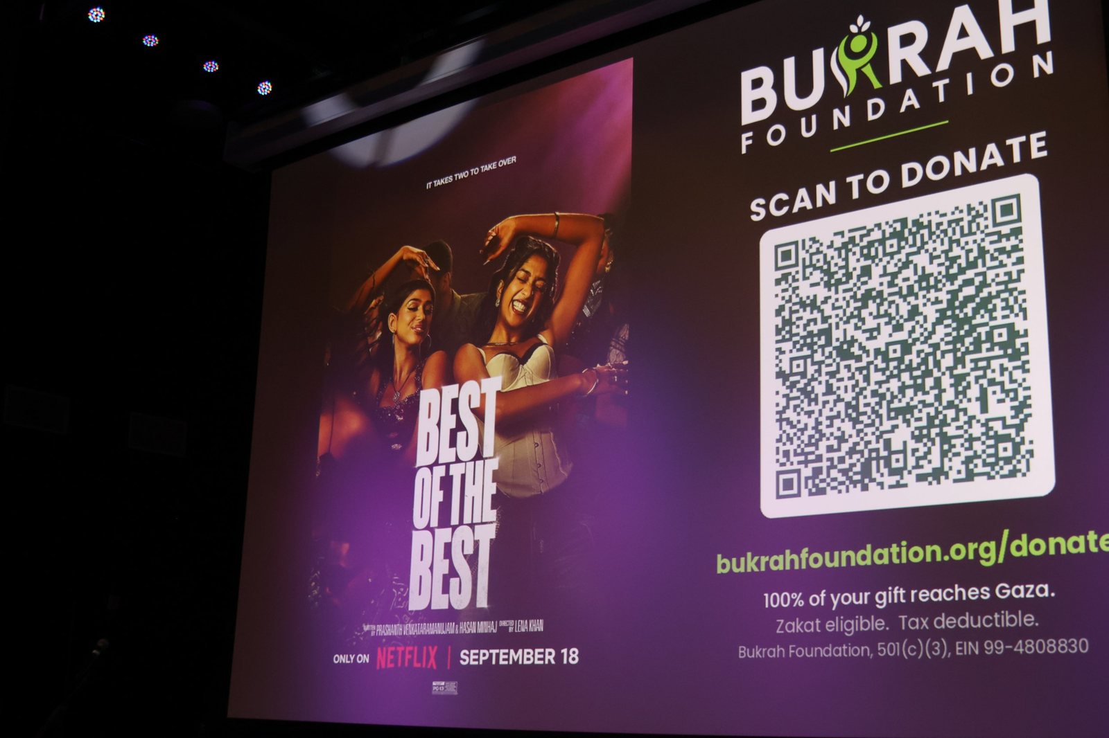 Theater screen showing the Best of the Best poster beside a Bukrah Foundation donation QR code