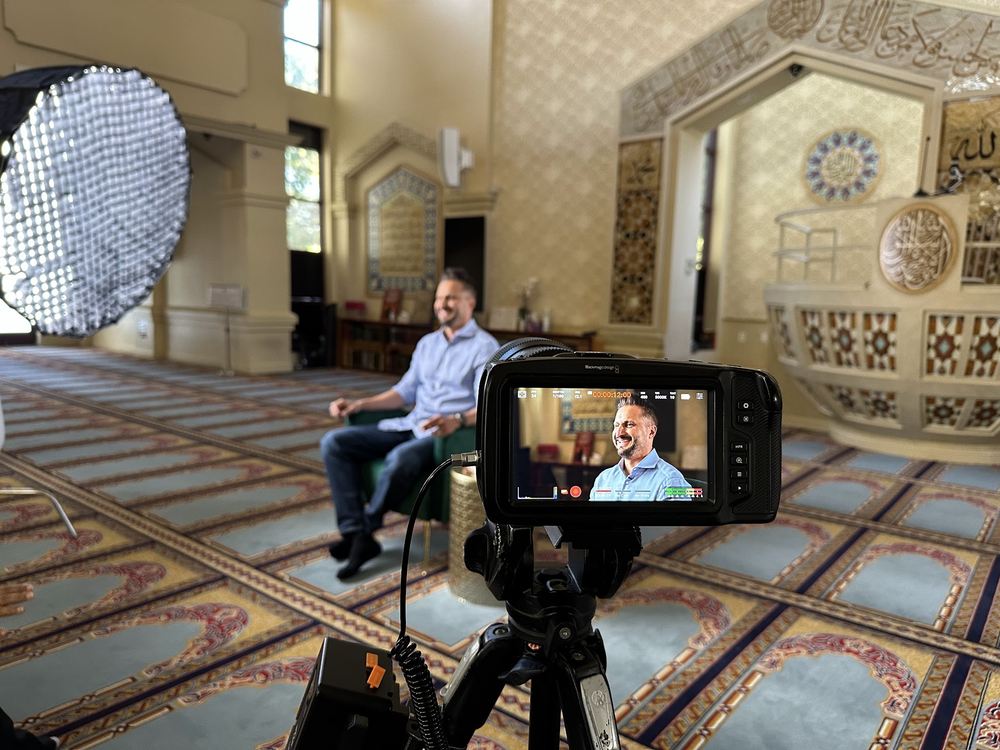 Asim Khan being filmed for an interview