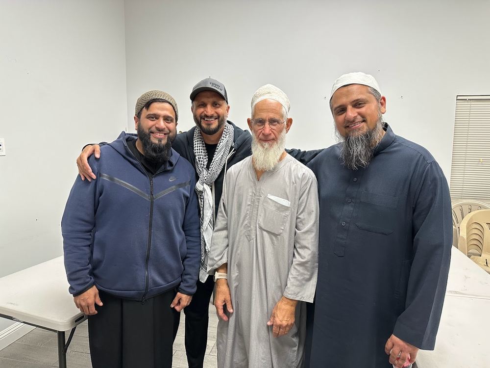 Asim Khan with community leaders at an Islamic Center