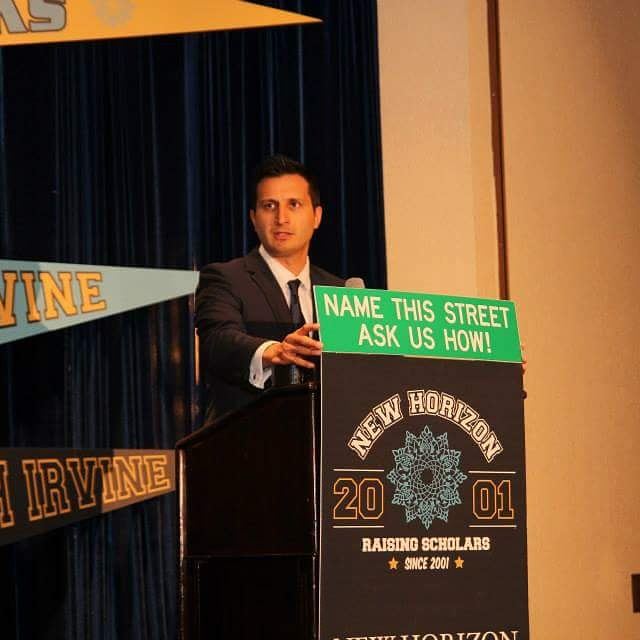 Asim Khan emceeing the New Horizon School fundraiser