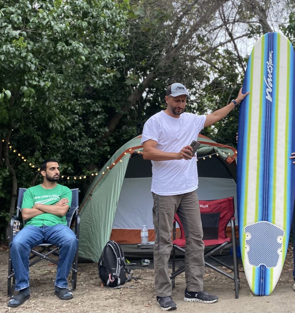 Asim Khan addressing the surf club at an annual camp